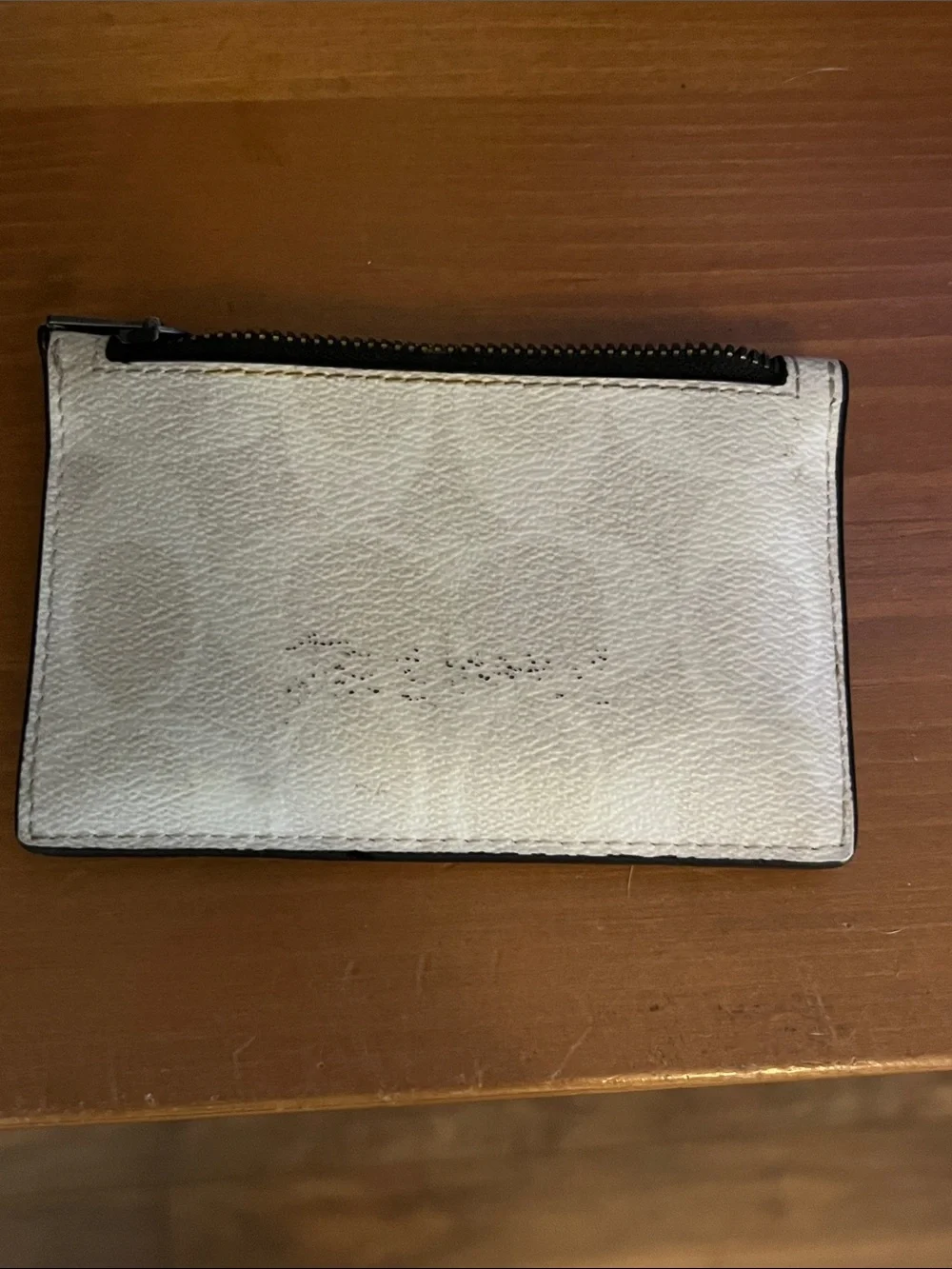 Coach pouch zipper
